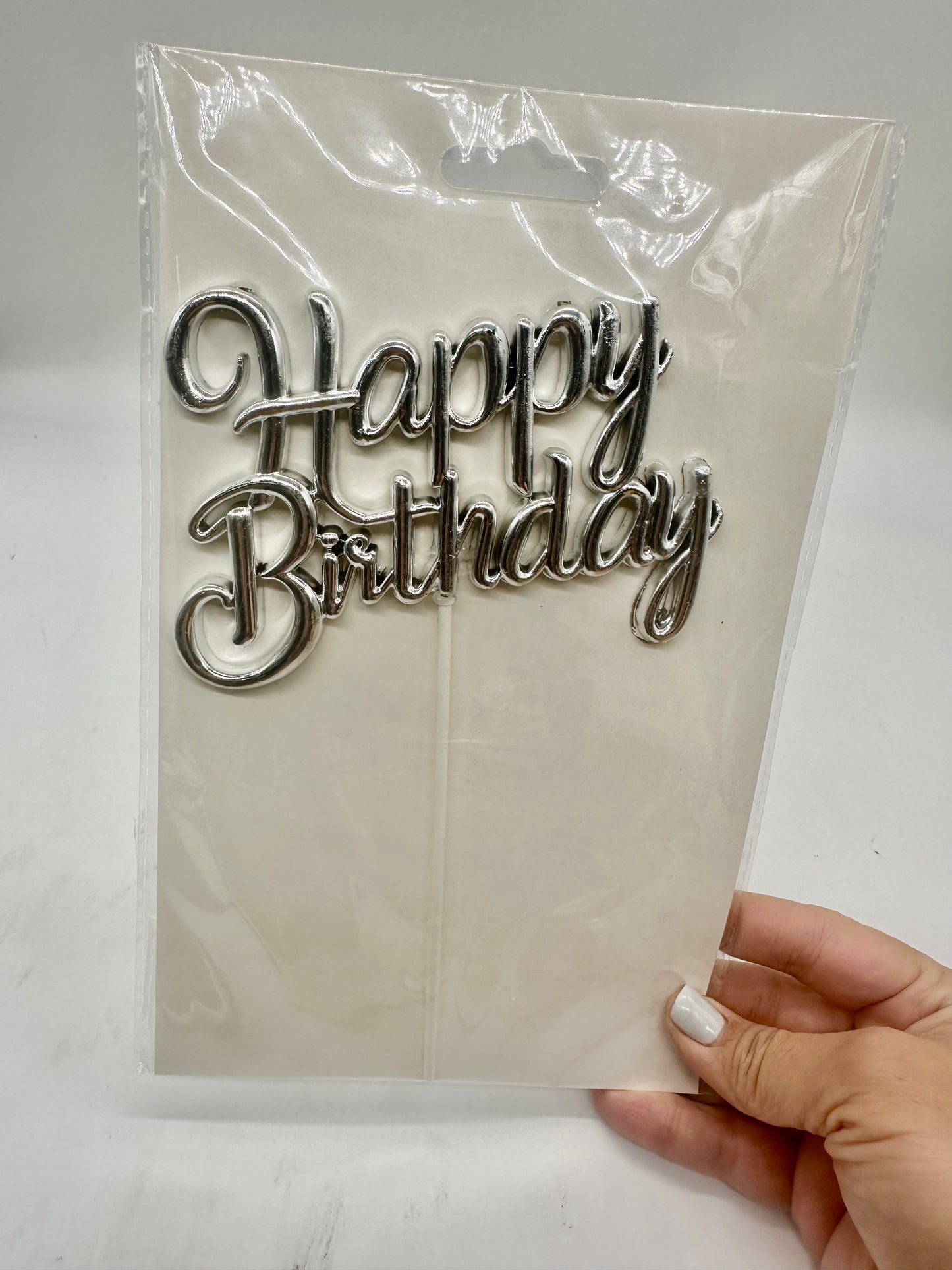Plastic cake topper silver